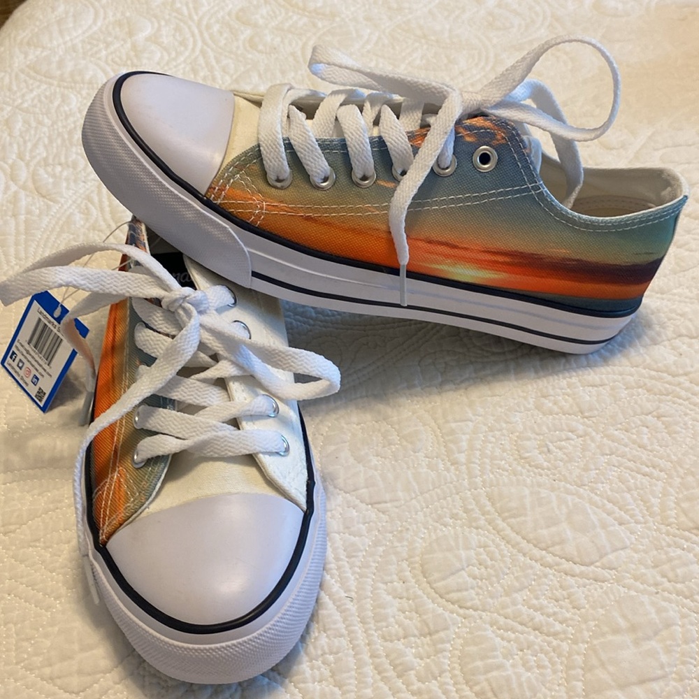 NWT Landmark Sneakers designed with a Sunset‎ on one side of each shoe